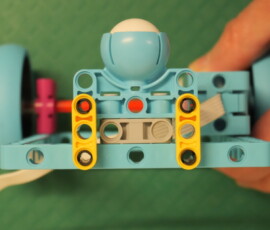 Yellow beams added to keep ball from wobbling.