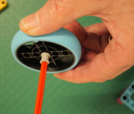 Bushing keeps wheel from rubbing frame.