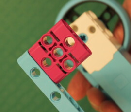 Axle support mounted on frame.